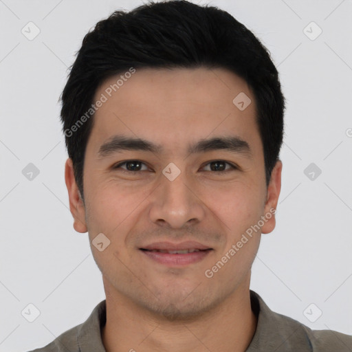 Joyful asian young-adult male with short  black hair and brown eyes