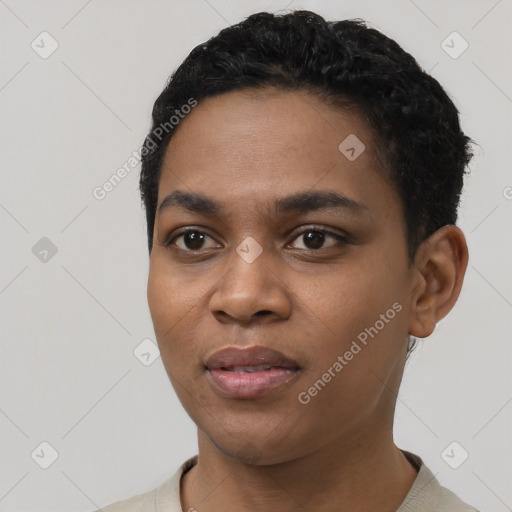 Joyful black young-adult female with short  black hair and brown eyes