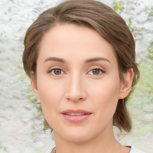 Joyful white young-adult female with medium  brown hair and green eyes