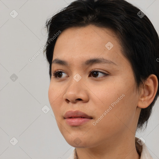 Neutral asian young-adult female with medium  brown hair and brown eyes