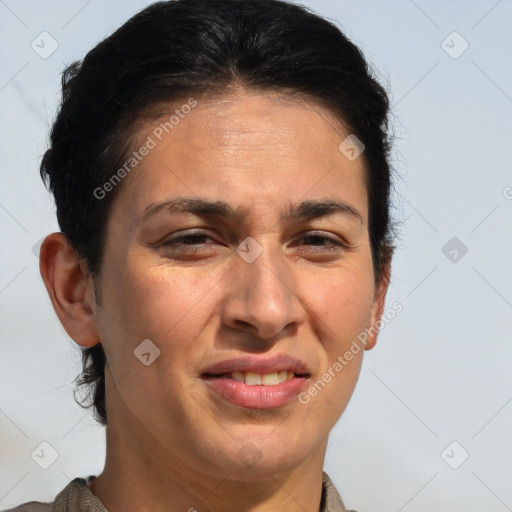 Joyful white adult female with short  brown hair and brown eyes