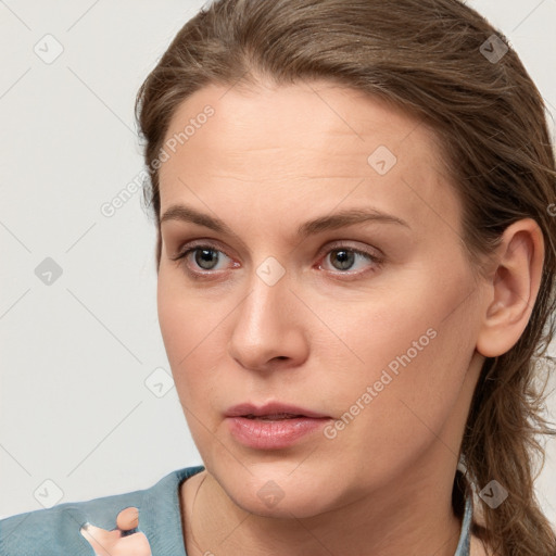 Neutral white young-adult female with medium  brown hair and grey eyes