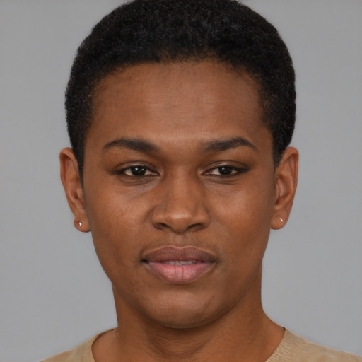 Joyful black young-adult female with short  black hair and brown eyes