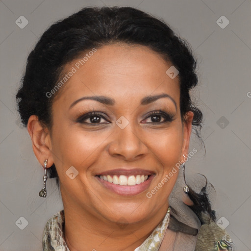 Joyful black adult female with medium  brown hair and brown eyes