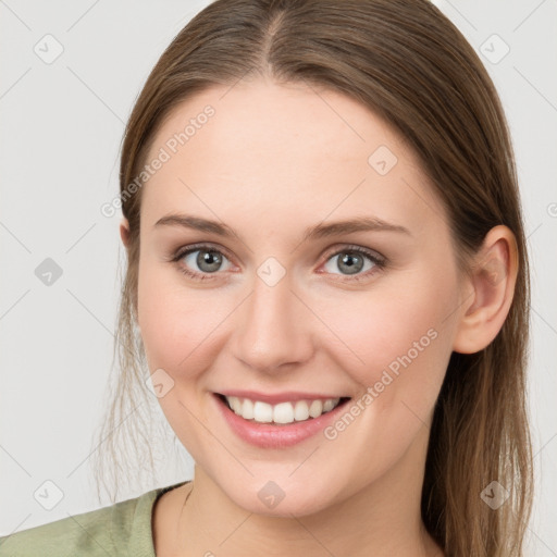 Joyful white young-adult female with long  brown hair and grey eyes