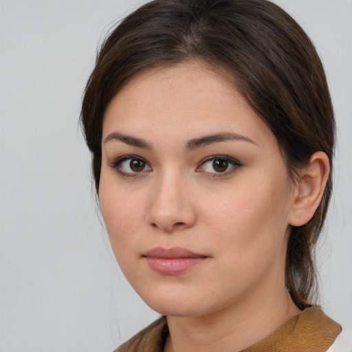 Neutral white young-adult female with medium  brown hair and brown eyes