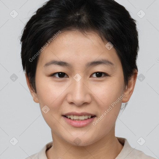 Joyful asian young-adult female with short  brown hair and brown eyes