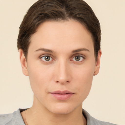 Neutral white young-adult female with short  brown hair and brown eyes