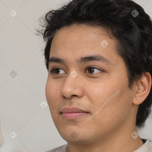 Neutral white young-adult male with short  black hair and brown eyes