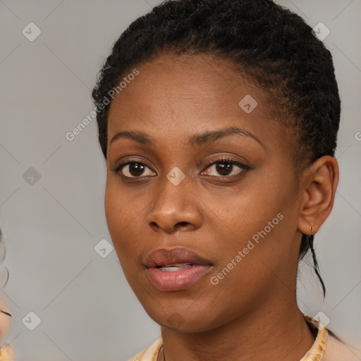 Neutral black young-adult female with short  brown hair and brown eyes