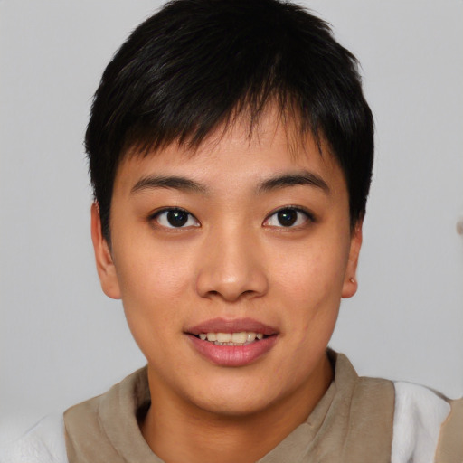 Joyful asian young-adult female with short  black hair and brown eyes
