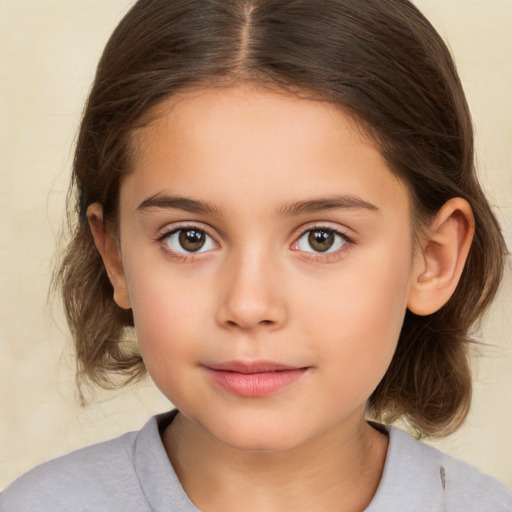 Joyful white child female with medium  brown hair and brown eyes