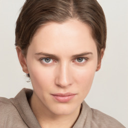 Neutral white young-adult female with short  brown hair and grey eyes