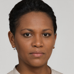 Neutral black young-adult female with short  black hair and brown eyes