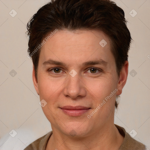 Joyful white adult female with short  brown hair and brown eyes