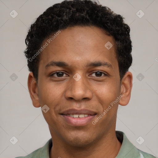 Joyful black young-adult male with short  brown hair and brown eyes