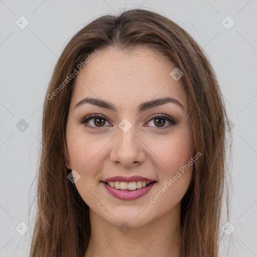 Joyful white young-adult female with long  brown hair and brown eyes