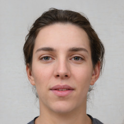 Neutral white young-adult female with short  brown hair and brown eyes