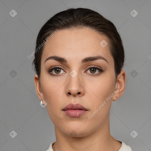 Neutral white young-adult female with short  brown hair and brown eyes