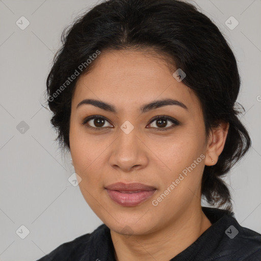 Joyful latino young-adult female with medium  brown hair and brown eyes