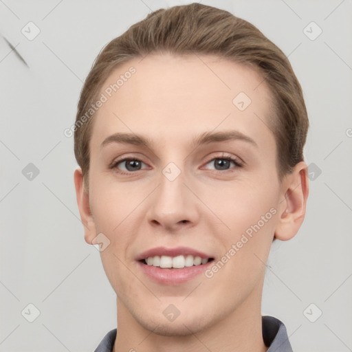 Joyful white young-adult female with short  brown hair and grey eyes