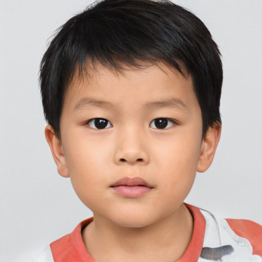 Neutral asian child male with short  brown hair and brown eyes