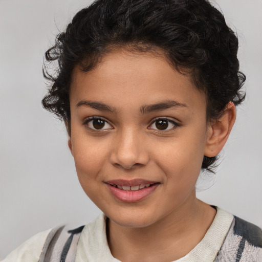 Joyful white child female with medium  brown hair and brown eyes