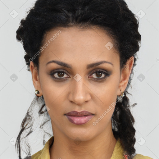 Joyful latino young-adult female with long  brown hair and brown eyes