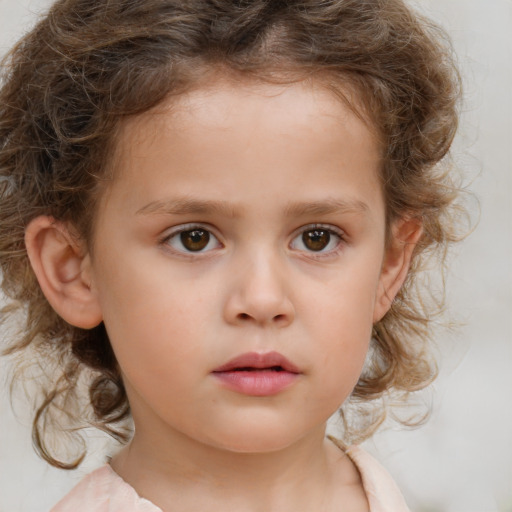 Neutral white child female with medium  brown hair and brown eyes