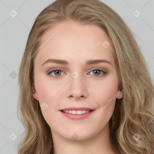 Joyful white young-adult female with long  brown hair and blue eyes