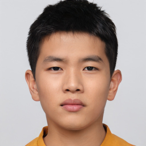 Neutral asian child male with short  black hair and brown eyes