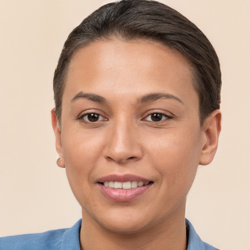 Joyful white young-adult female with short  brown hair and brown eyes