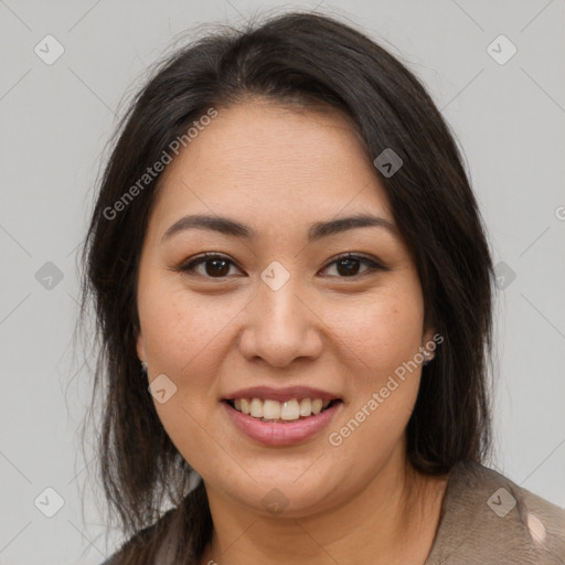 Joyful latino young-adult female with medium  brown hair and brown eyes