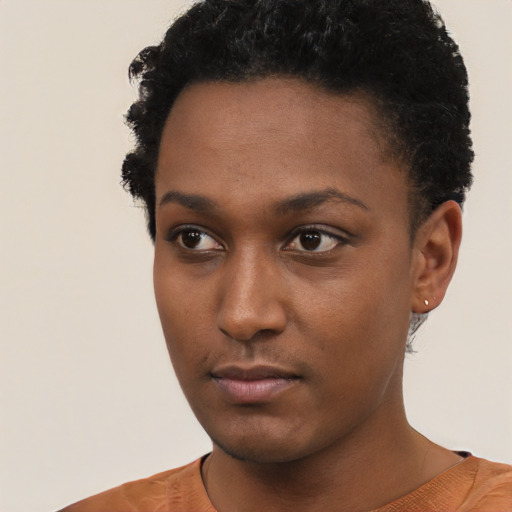 Neutral black young-adult female with short  black hair and brown eyes
