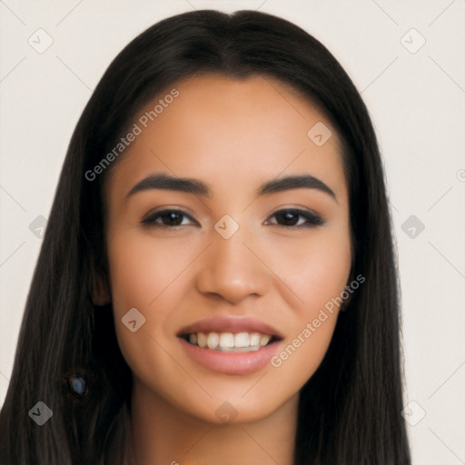 Joyful latino young-adult female with long  black hair and brown eyes