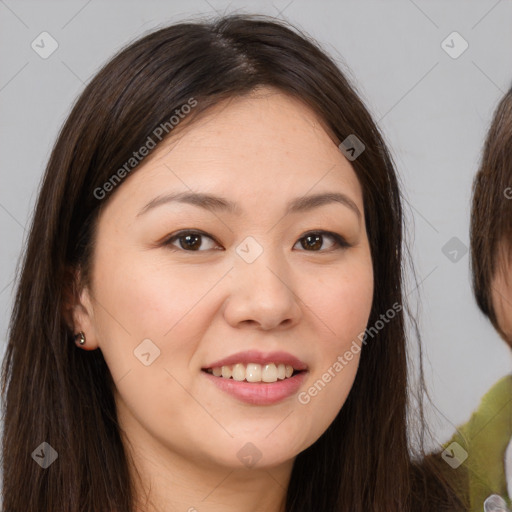 Joyful white young-adult female with long  brown hair and brown eyes