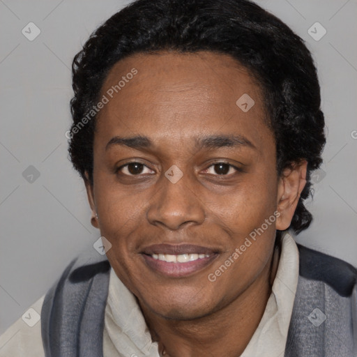Joyful black adult female with short  black hair and brown eyes