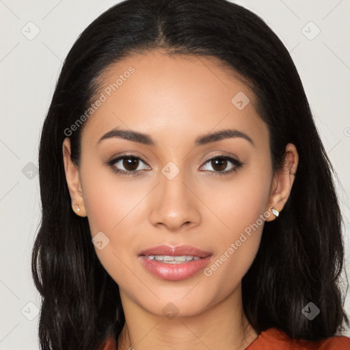 Joyful latino young-adult female with long  black hair and brown eyes