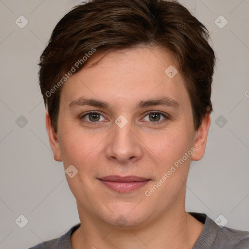 Joyful white young-adult female with short  brown hair and grey eyes