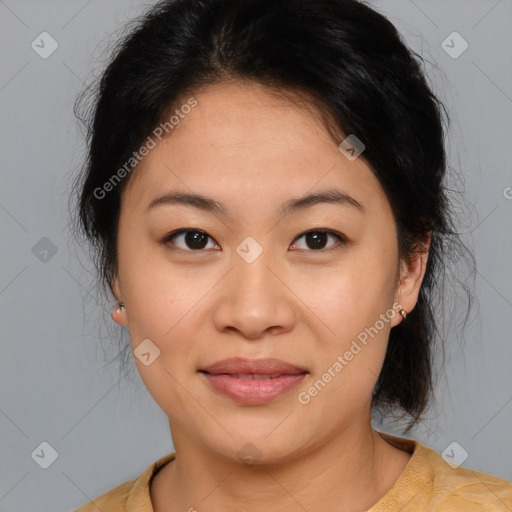 Joyful asian young-adult female with medium  brown hair and brown eyes