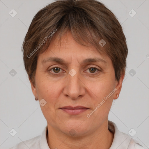 Joyful white adult female with short  brown hair and brown eyes