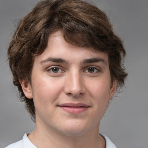 Joyful white young-adult male with medium  brown hair and brown eyes