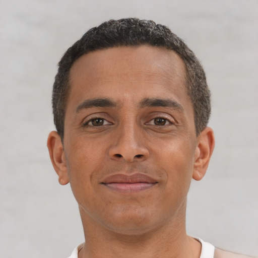 Neutral latino young-adult male with short  brown hair and brown eyes