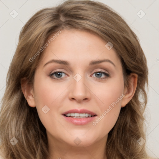 Joyful white young-adult female with long  brown hair and grey eyes