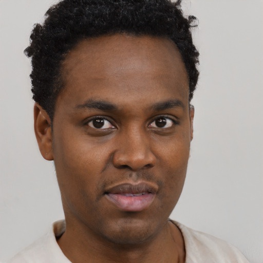 Neutral black young-adult male with short  brown hair and brown eyes