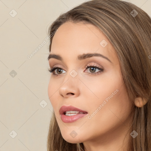 Neutral white young-adult female with long  brown hair and brown eyes