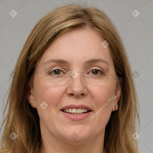 Joyful white adult female with medium  brown hair and grey eyes