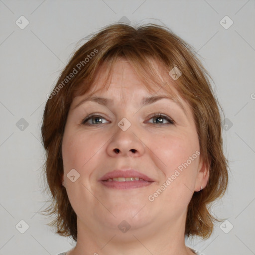 Joyful white adult female with medium  brown hair and brown eyes