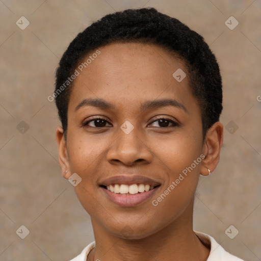 Joyful black young-adult female with short  brown hair and brown eyes