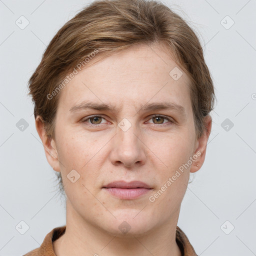 Joyful white young-adult female with short  brown hair and grey eyes